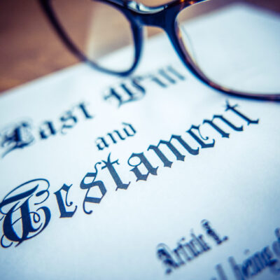 Retro Styled Detail Of A Last Will And Testament Document With Glasses